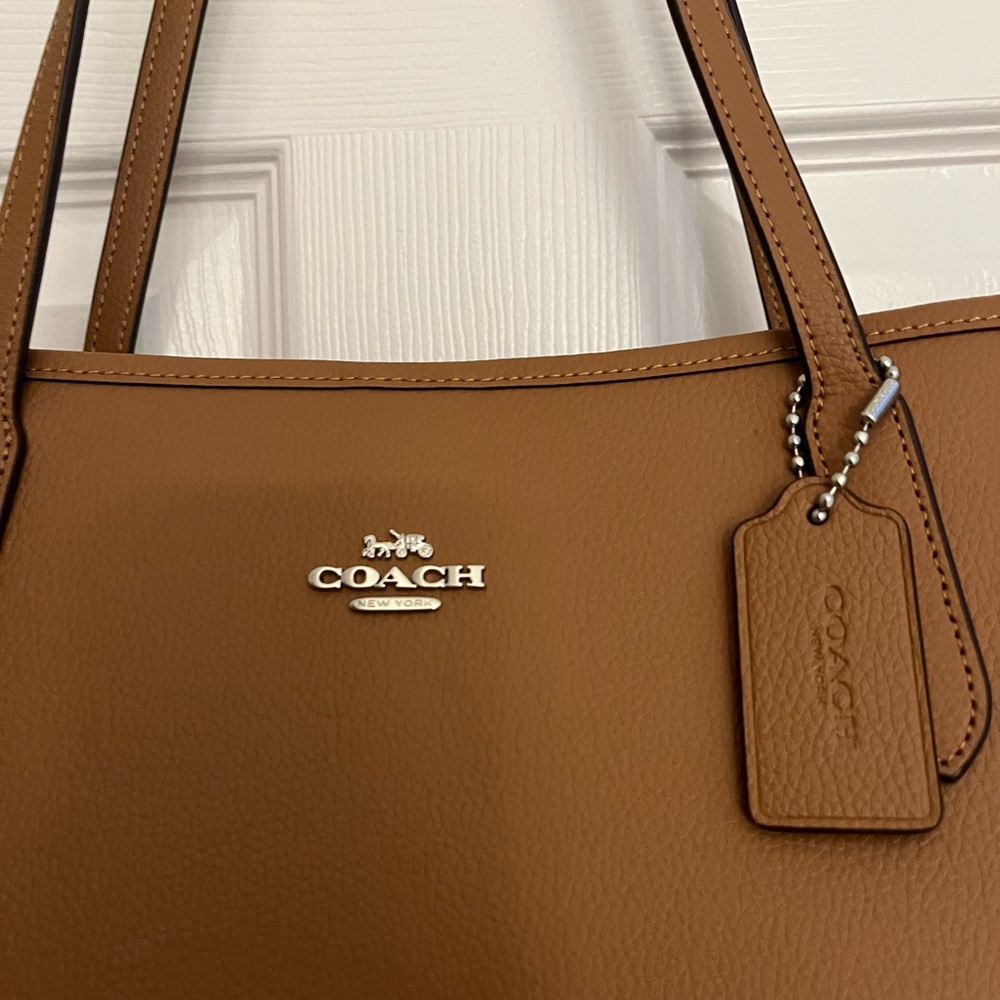 Coach lighting saddle large city tote